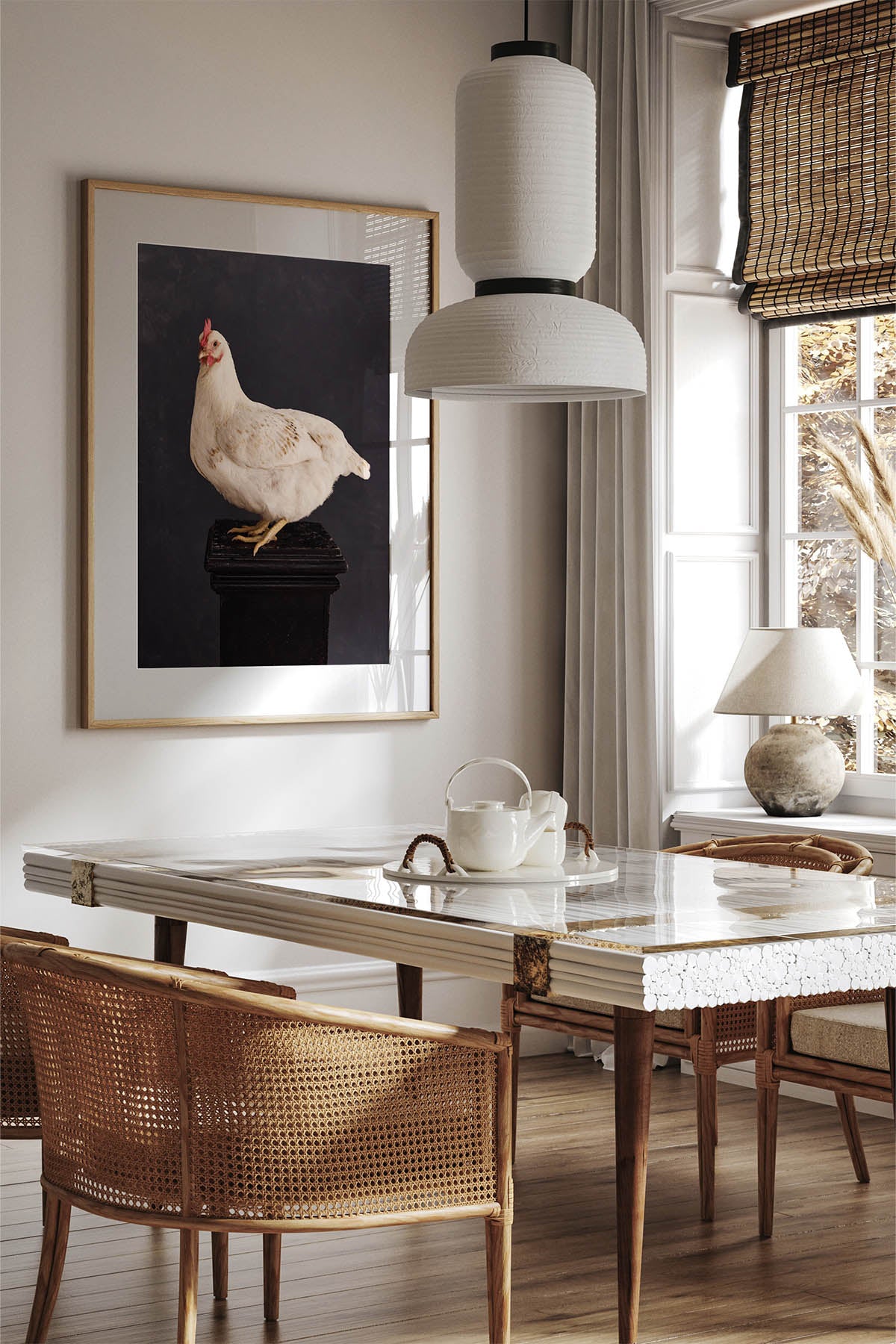 Fine Art Print Of A White Chicken Standing On A Black Plinth With A Black Background Framed On A Wall In An European Style Dining Room Near A WIndow.