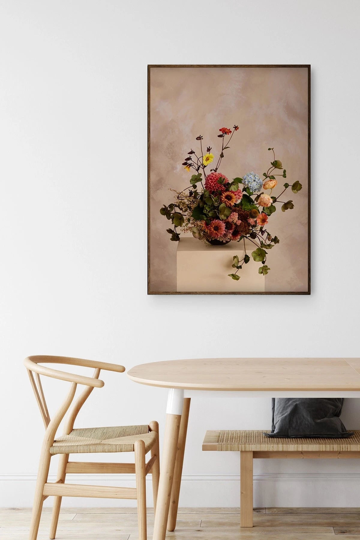Austin Bloom Fine Art Print Dutch Masters 2 in Dining room with a wooden table, chair, and bench against a white wall with a floral artwork.