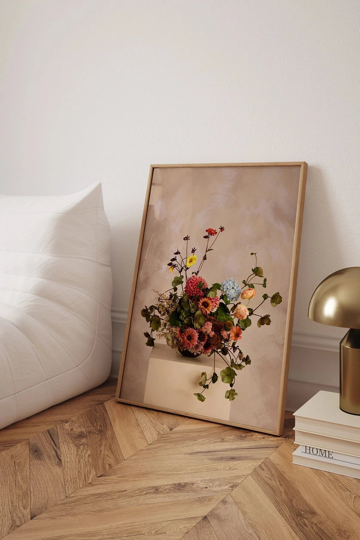 Austin Bloom Fine Art Print Dutch Masters 2 on a wooden herringbone floor with a lamp and books in the background.